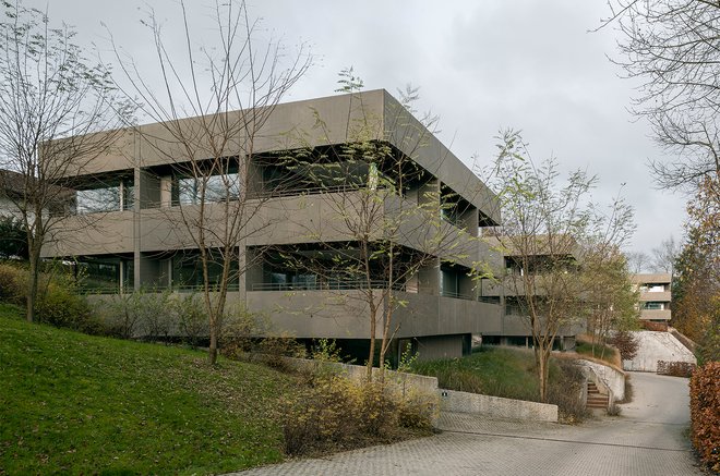 Four two-family dwellings with underground parking garage and two apartments