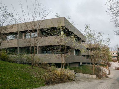 Four two-family dwellings with underground parking garage and two apartments