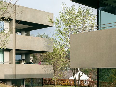 Four two-family dwellings with underground parking garage and two apartments